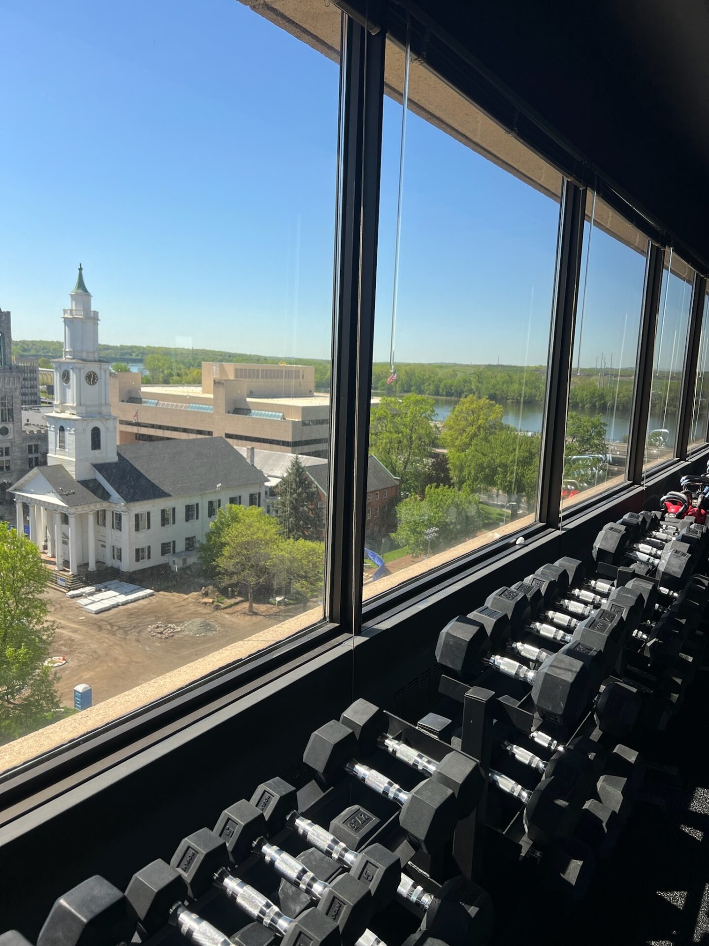 A thumbils on the floor with wode view of window A thumbils on the floor with wode view of window